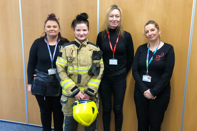 Some of the Media Make-up Students stood with one of the firefighters and their tutor Anne Derbyshire.