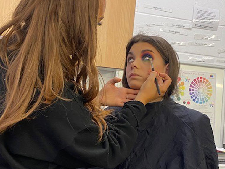 Social media influencer and YouTuber, Rebecca Capel delivering a make-up masterclass.
