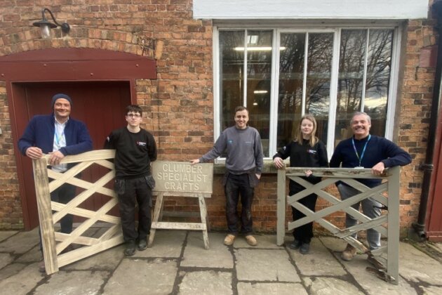 Staff and students outside the Specialist Craft Centre at Clumber Park.